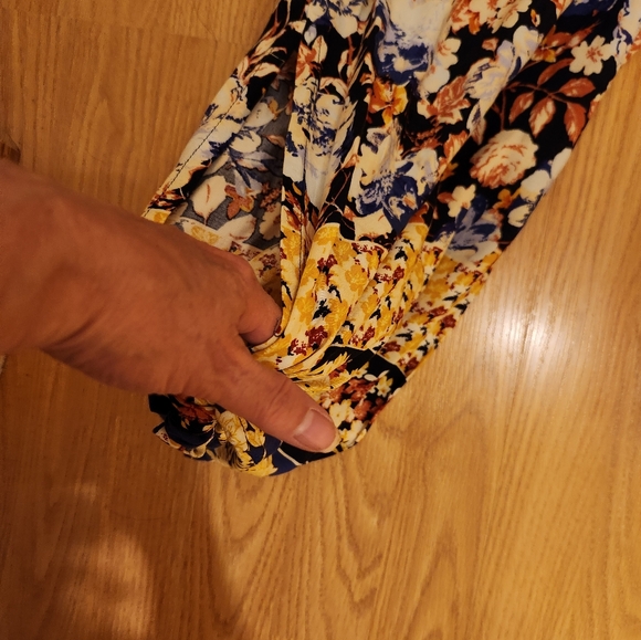 Maurices medium navy jumpsuit with slit pant legs that ties at bottom. - Picture 4 of 5